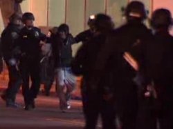 Occupier being arrested