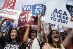 Supporters of the Affordable Care Act celebrate after the Supreme Court upheld the law
