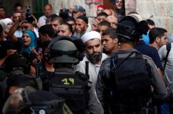Israeli police blocking Palestinian worshippers and protesters in the Old City of Jerusalem during riots in and around the Al Aqsa Mosque compound, September 13, 2015