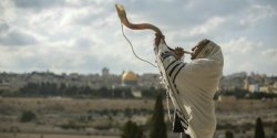 Man blowing a shofar