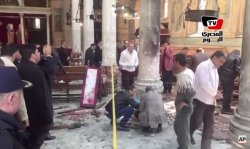 The interior of St. Peter Cathedral in Cairo, after the bombing of December 11, 2016. (Image source: AP video screenshot)