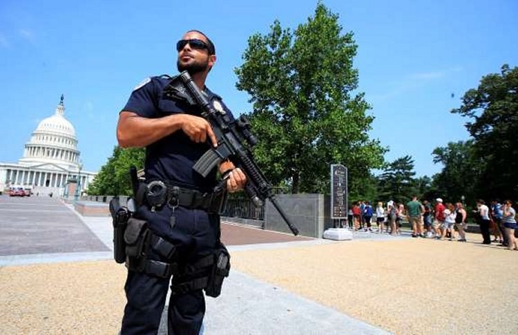 Capitol Hill Police Officer Nathan Rainey stands guard on Capitol Hill in Washington, D.C. on Wednesday, June 14, 2017, after House Majority Whip Steve Scalise (R-La.) was shot during a congressional baseball practice in Alexandria, Va.