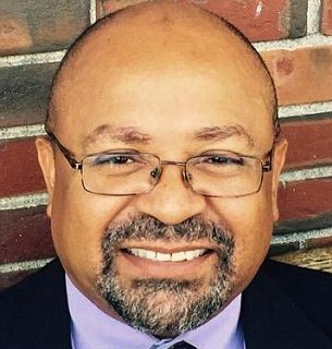 Professor Johnny Eric Williams, Trinity College