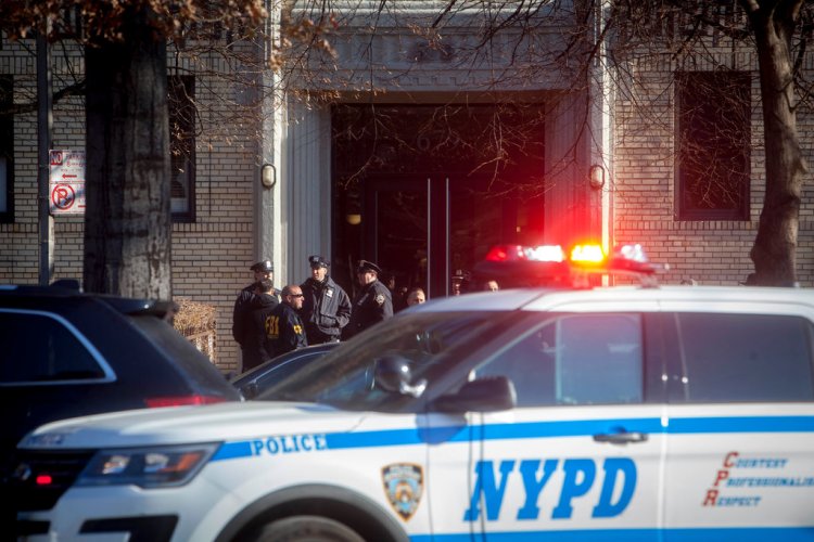 Law enforcement officers investigated on Monday at an address on Ocean Parkway in Brooklyn that was linked to Mr. Ullah. Dave Sanders for The New York Times