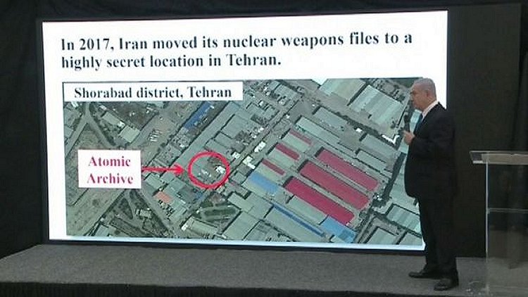 Israeli Prime Minister Benjamin Netanyahu shows where Iran may have moved its nuclear weapons files to a location in Tehran after signing the nuclear deal.  (AP)