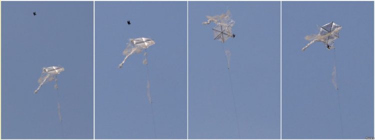 A combination picture shows an Israeli drone intercepting a Palestinian kite in an area where kites and balloons have caused blazes, on the Israeli side of the border between Israel and the Gaza Strip, June 8, 2018.