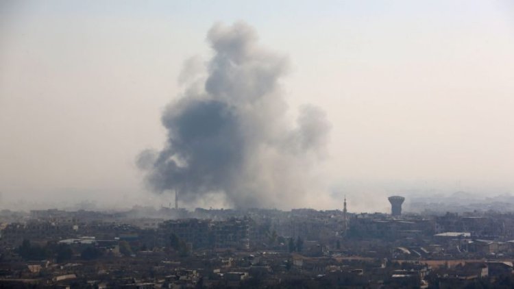 An illustrative photo of smoke rising as Syrian forces battle opposition fighters in the rebel-held town of Harasta on the outskirts of Damascus, January 8, 2018. STRINGER/AFP
