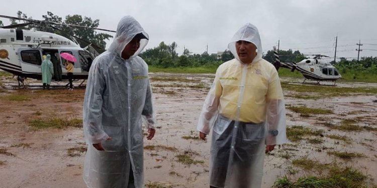 Rescue personnel near the caves on Tuesday, the third day of rescues. REUTERS/Soe Zeya Tun
