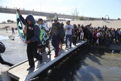 Migrants crossing over the U.S. southern border