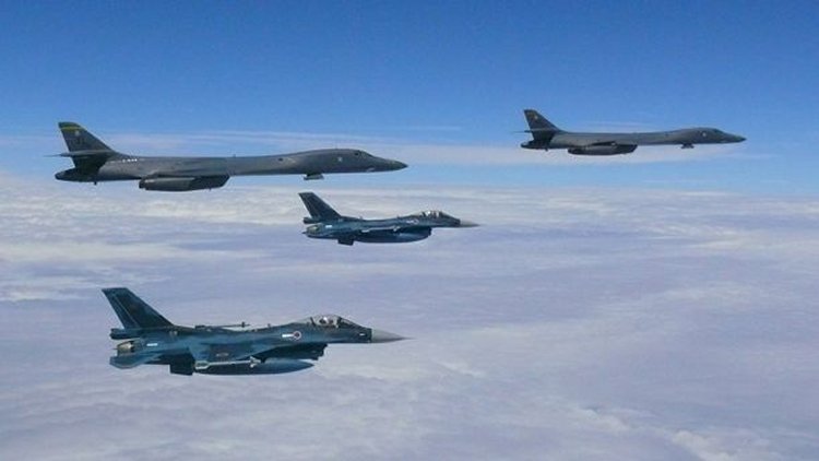 Two U.S. Air Force B-1B Lancers assigned to the 37th Expeditionary Bomb Squadron, deployed from Ellsworth Air Force Base, South Dakota, flew from Andersen Air Force Base, Guam, for a 10-hour mission, flying in the vicinity of Kyushu, Japan, the East China Sea, and the Korean peninsula, Aug. 7, 2017. (U.S. Air Force)